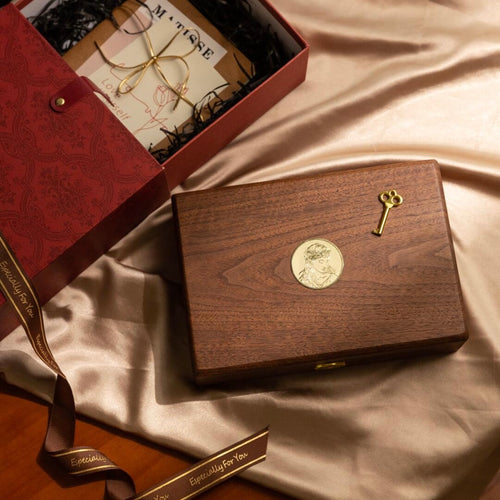 Black walnut jewelry box interior showing soft velvet lining and organized compartments for rings, necklaces and bracelets
